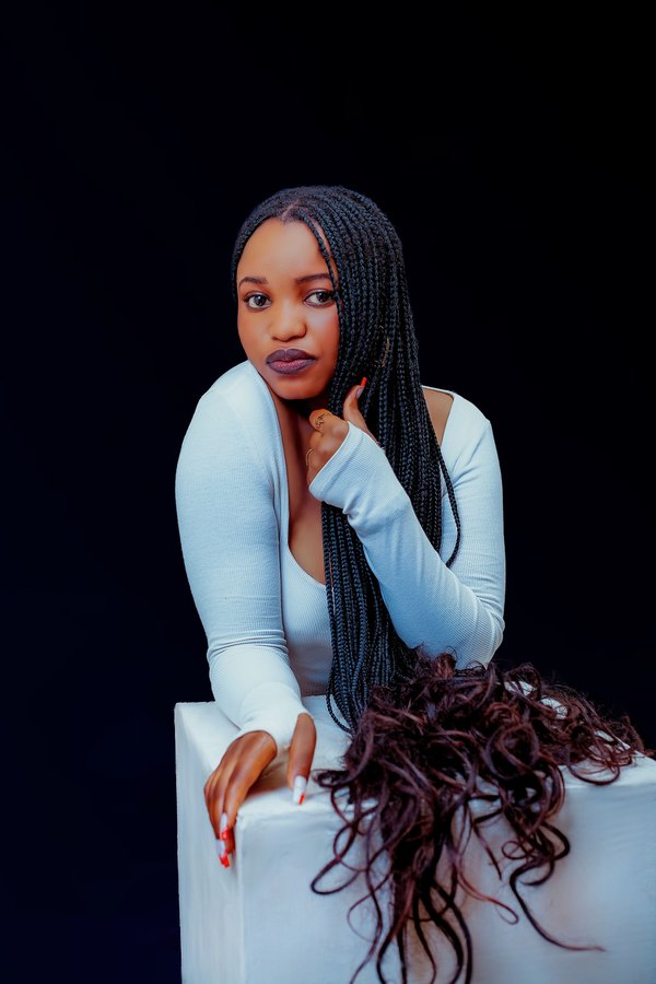 Long knotless braids with curly burgundy ends