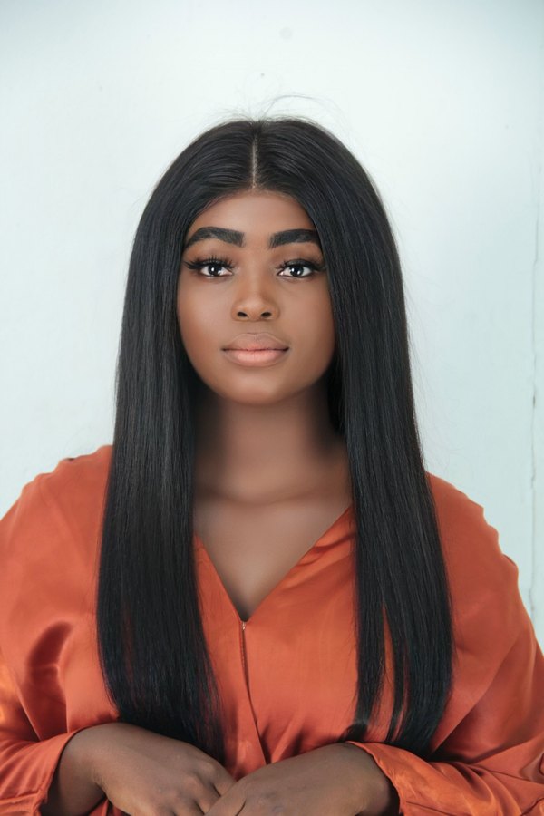 Sleek middle-part straight hair
