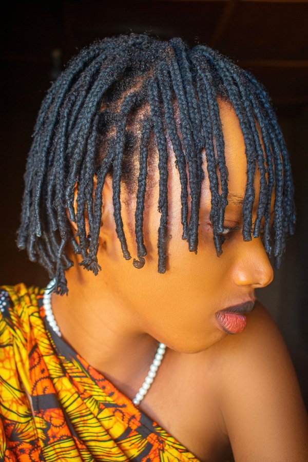 Short fresh starter locs, side profile